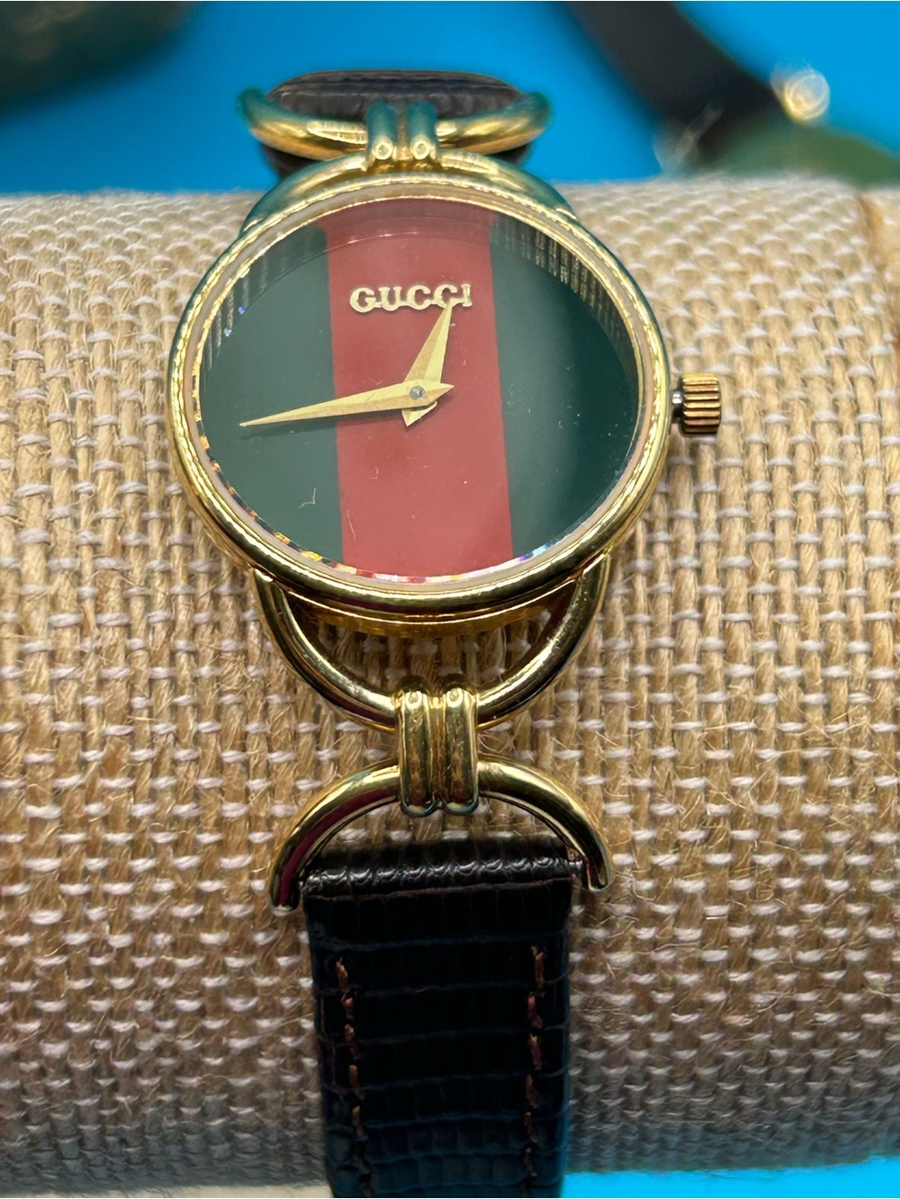 Authentic Gucci Gold and Green Timepiece with iconic Cherry Line Stripe